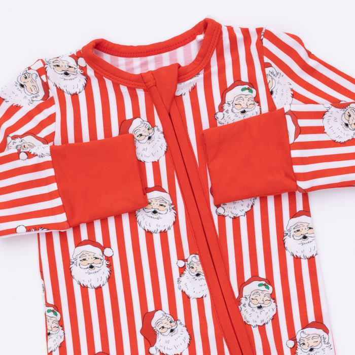 Embrace timeless holiday charm with this Vintage Santa Stripe Convertible Romper from Angel Dear. Crafted in soft bamboo fabric, this classic red and white striped design captures nostalgic Christmas spirit while offering comfort for growing infants. The convertible design adapts to your baby's needs, making it perfect for cozy season styling or layering year-round. Gentle bamboo construction ensures breathable wear for all-day comfort.